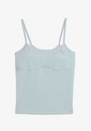 Gaiši zils kamzolis ar plāniem siksniņām, izgatavots no gludas auduma. Tam ir izliekta šuve krūšu daļā un neliels logo augšējā kreisajā stūrī.