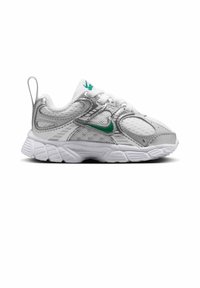 White and silver sports sneaker with green logo, mesh and synthetic upper, cushioned sole, and pull tab at the heel.