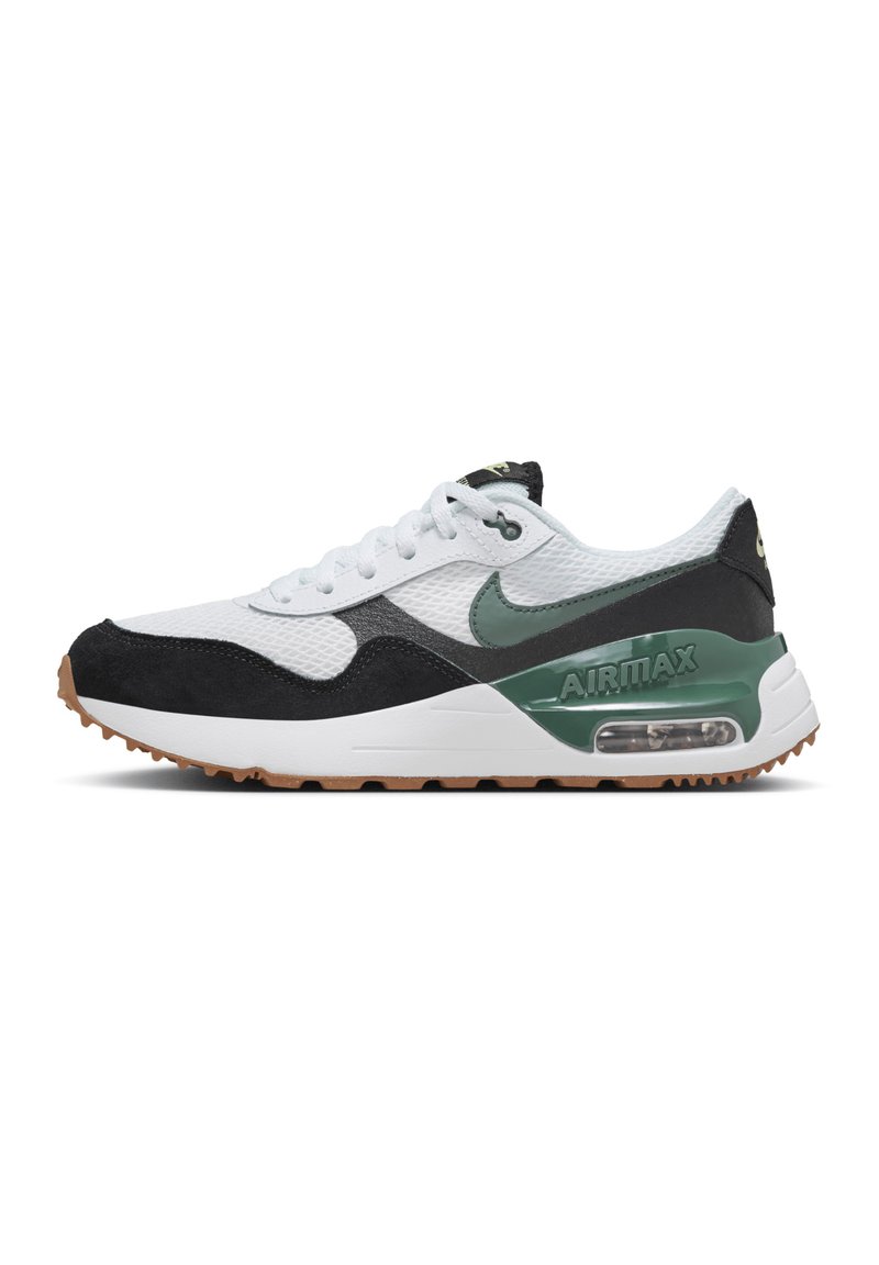 Sneaker in bianco e nero con dettagli verdi, tomaia in rete, sovrapposizioni in suede e ammortizzazione ad aria visibile nella suola. Soletta in gomma con motivo di trazione.