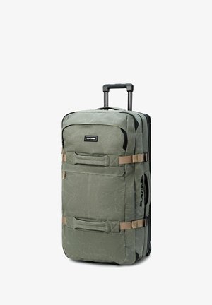 Sac de voyage à roulettes vert avec un extérieur texturé et durable, deux poignées de transport et deux sangles de compression. Équipé d'une poignée extensible.