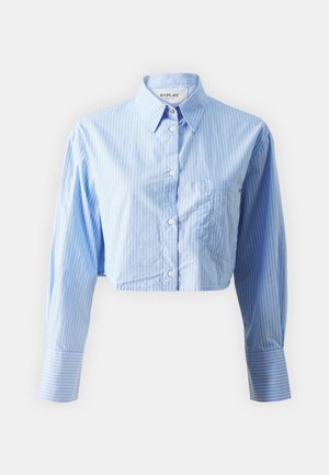 Blue crop button-up shirt with white vertical stripes. Features a classic collar and long sleeves with cuff contrast. Small front pocket.