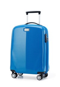 Valise rigide bleue avec une surface texturée, quatre roues, une poignée télescopique et un cadenas à combinaison sur le côté.