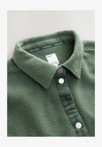 Ausgewählt, khaki green