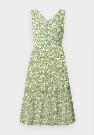 Roheline lilleline kleit V-kaelusega ja ilma varrukateta, millel on smockitud rinnaosa ja kihilistest ripsmetest äär. Tekstureeritud kangas.