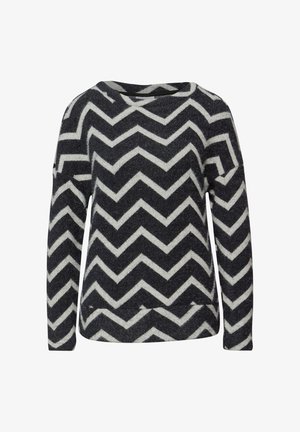 Svartvit tröja med chevronmönster, lös passform, vid halsringning och långa ärmar. Tillverkad av texturerat stickat tyg.