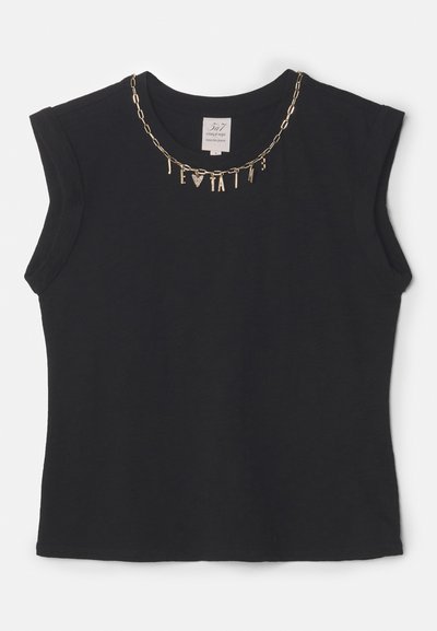 Black short-sleeve t-shirt with a crew neckline, featuring a gold chain necklace with hanging charms, including letters and symbols.