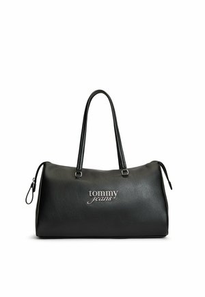 Sort rektangulær håndtaske med to håndtag og "tommy jeans" logo i hvid foran, lynlåslukning på toppen.
