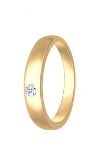 Guldring med en slät, polerad yta och en enda diamantdetalj på ena sidan. Enkel, rundad design.