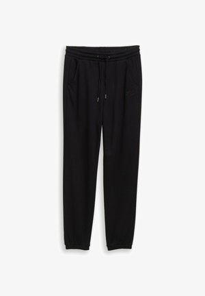 Pantaloni della tuta neri realizzati in morbido tessuto, con vita elastica e coulisse regolabile, tasche laterali e polsini a coste.