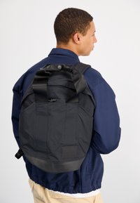 The North Face - NEVER STOP DAYPACK UNISEX - Mugursoma - tnf black Miniatūras attēls 1