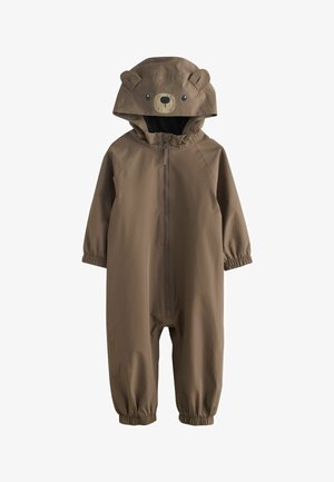Rudas kūdikio kombinezonas su gobtuvu, kuriame yra meškos ausytės ir veidas, priekyje užtrauktukas, elastinės rankogaliai ant rankovių ir čiurnų.