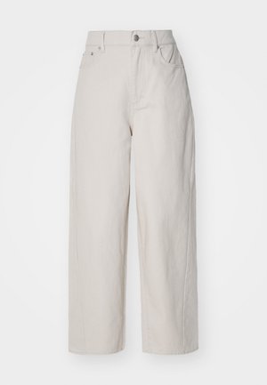 Beige wide-leg cotton trousers with a high waist, button and zipper closure, and four pockets; smooth texture with denim finish.