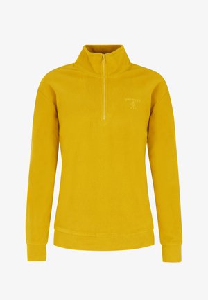 Żółty, teksturowany sweter z kołnierzem na zamek błyskawiczny do połowy, długimi rękawami i dopasowanym ściągaczem. Posiada małe logo w jaśniejszym odcieniu.