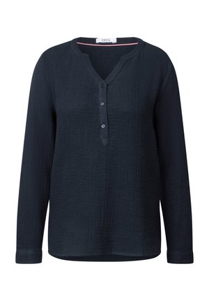 Marineblaues Langarmhemd mit strukturiertem Stoff, Henley-Halsausschnitt und drei dunklen Knöpfen. Hat einen versteckten pinken Akzent innen am Kragen.
