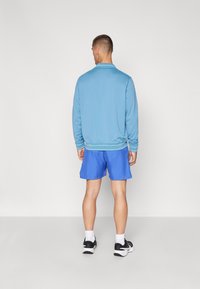 Nike Performance COURT VICTORY - Sport rövidnadrágok - astronomy blue/white