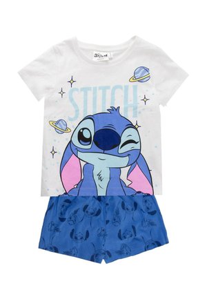 Top bianco a maniche corte con il personaggio blu di Stitch che fa l’occhiolino, pianeti e stelle, abbinato a pantaloncini blu con stampe di volti di Stitch.