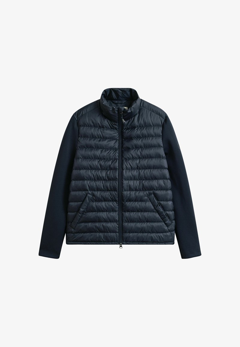 Dunkel marineblaue gesteppte Jacke mit durchgehendem Frontreißverschluss, Stehkragen und zwei schrägen Fronttaschen.