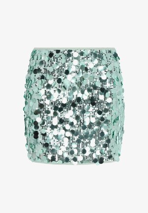 Světle zelená minisukně zdobená flitry, s přiléhavým střihem a překrývajícími se odrazivými kulatými flitry vytvářejícími texturovaný povrch.