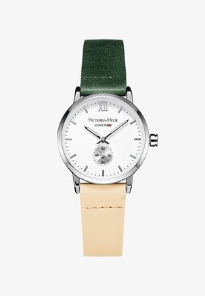 Orologio argento con quadrante bianco, bracciale in pelle verde e cinturino in pelle beige. Presenta il numero romano XII e un sub-quadrante per i secondi.