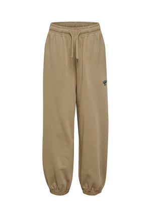Pantalon de survêtement beige fuselé avec taille élastique, cordon de serrage, poignets élastiques et un petit logo sombre sur la cuisse droite.