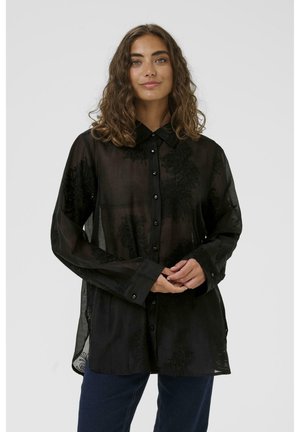 Black sheer shirt with long sleeves, floral embroidery, button-up front, and a pointed collar. Soft texture with lightweight material.