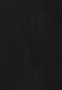 ONLY ONLKELDA EMERY PULL UP - Calças - black