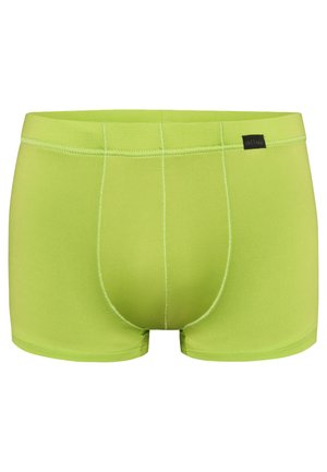 Męskie bokserki w limonkowym kolorze z widocznymi szwami i małą czarną metką marki na pasie.