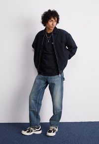 Carhartt WIP RUNAWAY - T-shirts med print - black/wax