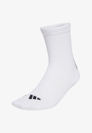Calcetín blanco hasta media pantorrilla con logo negro cerca de los dedos, puño acanalado y textura de tela lisa, mostrado sobre un fondo blanco liso.