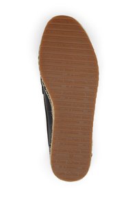 Black shoe sole with textured rubber, featuring embossed brand name and size. Rounded shape and contrasting light-colored edge.