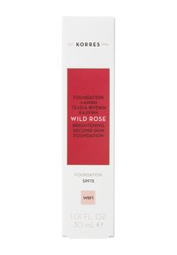 Packaging de fond de teint seconde peau lumineux avec texture blanche, étiquette rouge vif, accents dorés et SPF15, 30 mL. Marque : Korres.