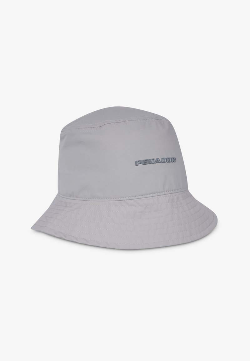 Light gray bucket hat made from soft fabric, featuring a wide brim, stitched detailing, and "PEGADOR" logo in a darker shade.