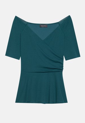 Teal off-the-shoulder top with short sleeves, featuring a wrap design and flared hem, made from a soft, stretchy fabric.
