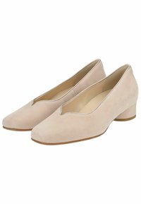 Scarpe in suede beige con tacco basso a blocco, punta appuntita e un taglio a V lungo la parte superiore. Tessuto morbido con dettagli minimi.