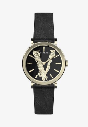 Versace-Uhr mit einer Gehäuse in Goldton, schwarchem Zifferblatt, geprägtem Lederarmband und einem komplexen V-Design in der Mitte. Mit goldenen Stundenmarkierungen.