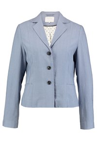 Jasnoniebieska marynarka z kołnierzykiem, trzema czarnymi guzikami i dwiema kieszeniami z przodu. Teksturowany materiał i wzór w kropki wewnątrz.