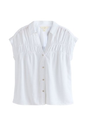 Biała bluzka z krótkim rękawem, marszczonym karczkiem, kołnierzykiem i zapięciem na guziki z przodu.