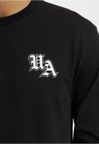 UNFAIR ATHLETICS UNISEX czarny