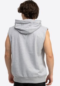 Gray sleeveless hoodie with a drawstring hood, soft fabric texture, ribbed hem, and a relaxed fit, showing the back view.