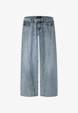 Lyseblå vidde jeans med forlommer, bæltestropper, knaplukning og karakteristisk skråt sømdetalje på benene.