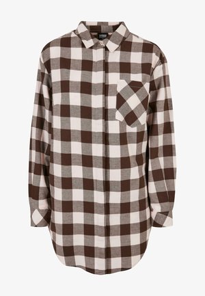 Brown and white plaid flannel shirt with long sleeves, a button-up front, and a single chest pocket. Soft texture and rounded hem.