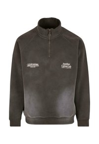 Pullover in fleece grigio scuro con colletto a mezze zip. Presenta due loghi stampati sul petto. Tessuto morbido e vestibilità regolare. Polsini e orlo a costine.