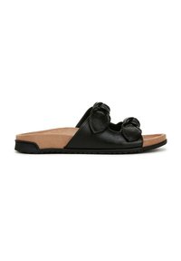 Zwarte leren instapsandalen met twee knoopaccenten, een tan suède voetbed en rubberen buitenzool. Flat design met open teen en zijkanten.
