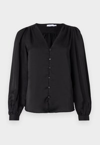Blusa negra de tejido suave, con escote en V, botones en la parte frontal y mangas largas abullonadas con puños ajustados.