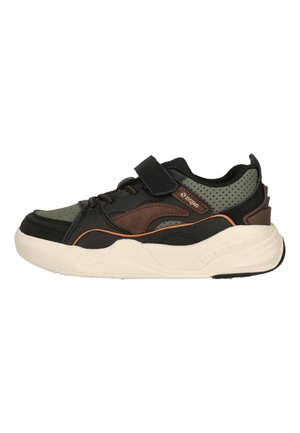 Black, brown, and olive green sneaker with white chunky sole, Velcro strap, perforated side panel, and “Zigzag” label.