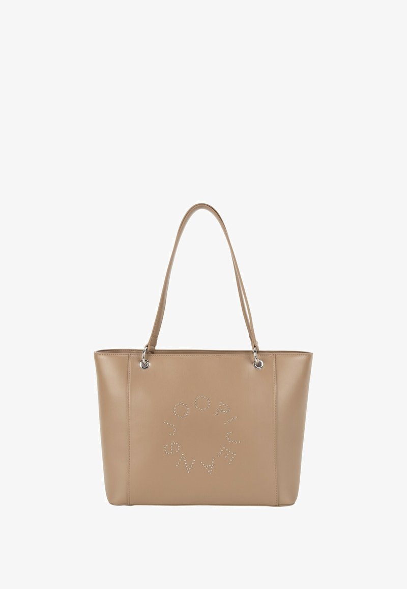 Beżowa torba typu tote z faux skóry z dwoma długimi uchwytami i okrągłym, ozdobionym ćwiekami wzorem na froncie. Gładka faktura i usztywniony kształt.