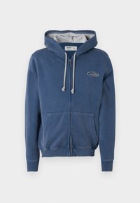 Μπλε φούτερ με φερμουάρ, κατασκευασμένο από απαλό υλικό. Διαθέτει γκρι εσωτερική επένδυση στο κουκούλι, μπροστινές τσέπες και ένα μικρό λογότυπο στο στήθος.