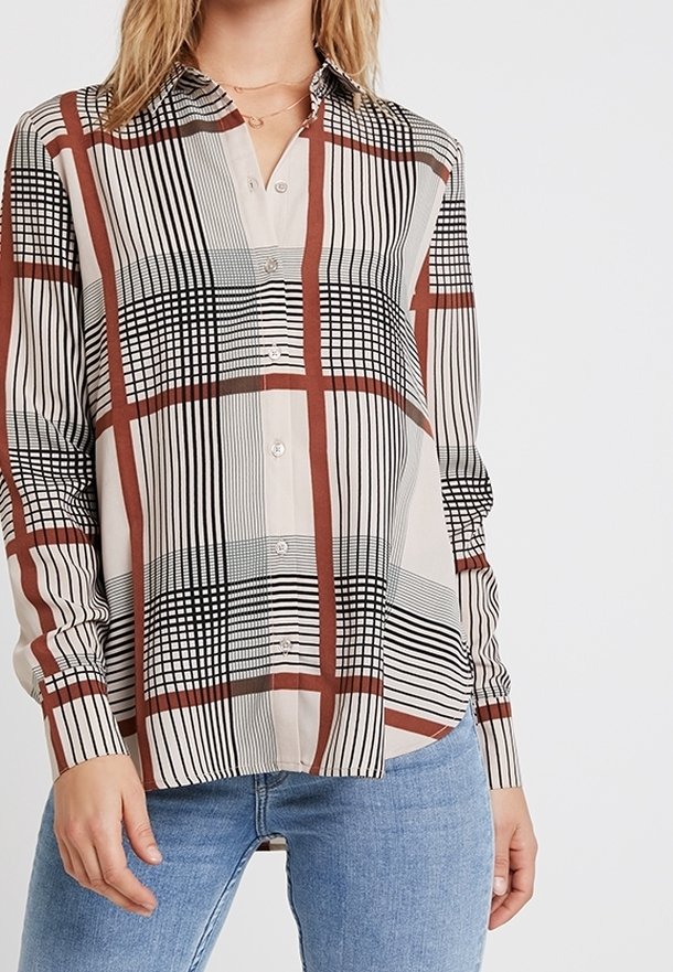 Button-up shirt with a beige background featuring a black and red plaid pattern, long sleeves, and a collar. Smooth fabric texture.
