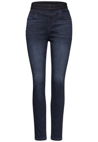 Mörkblå denimjeans med en figurnära design, som har en bred elastisk midja och femficksmodell, slät yta och minimal urtvättning.
