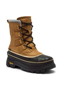 Brun läder vinterkänga med pälsfoder, svart gummisula, snörningsdesign och Vibram-märke. Har guldfärgad detalj.